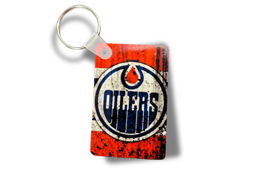 Keychain with Oilers logo on a white background